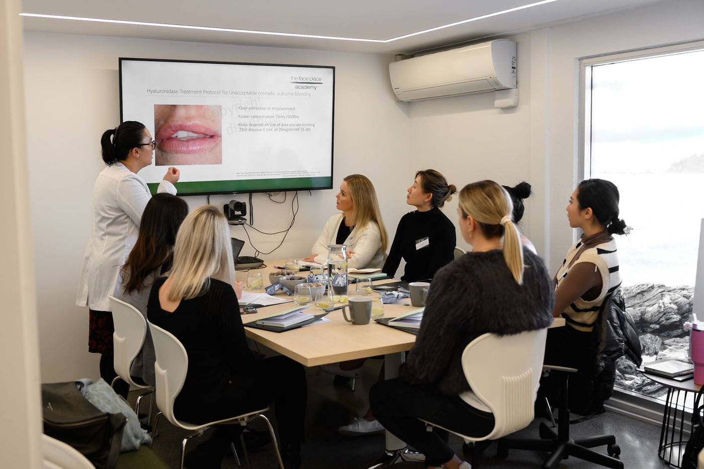 Practitioners in a small-group training session at TFP Academy