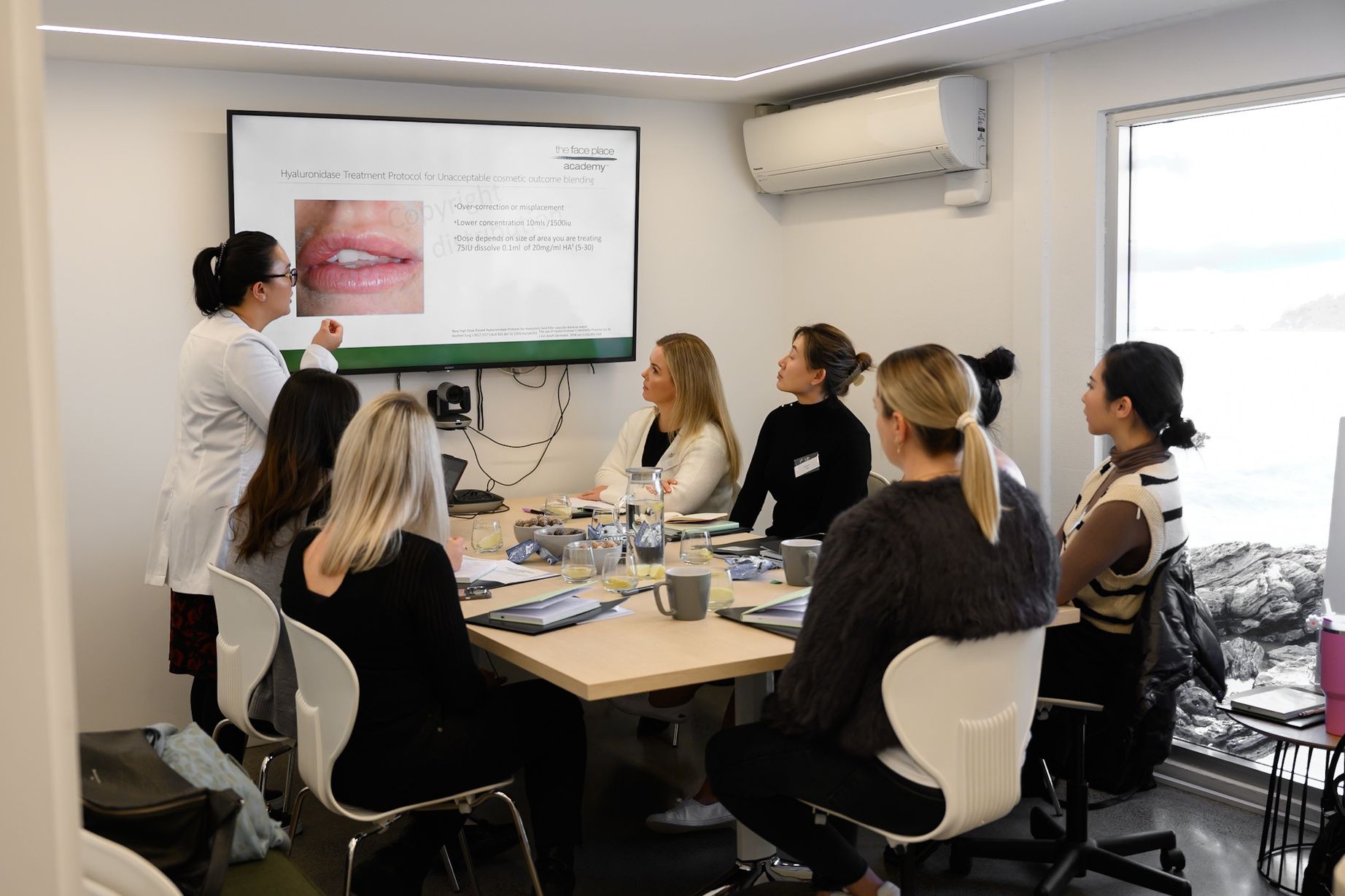 Practitioners in a small-group training session at TFP Academy